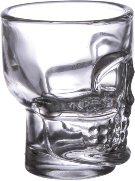 Clear skull-shaped shot glass on a white background