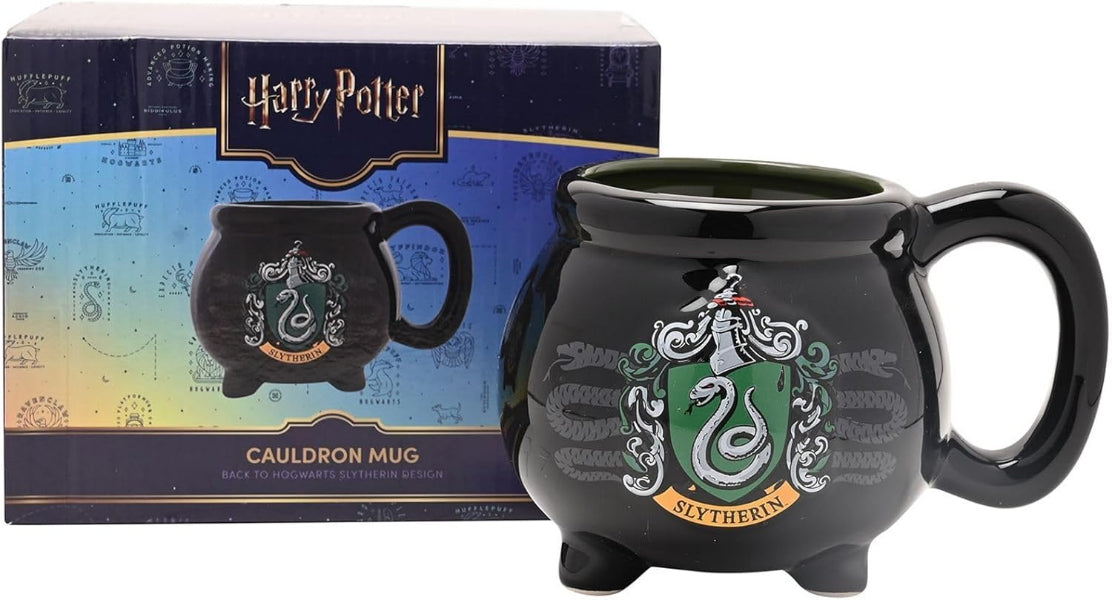 Black mug with Slytherin crest from Harry Potter series in front of its packaging