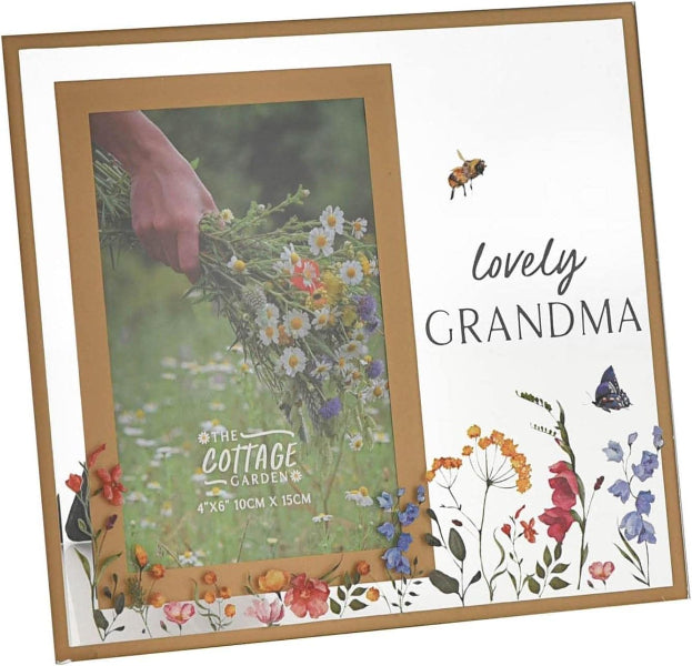 Floral-themed picture frame with 'The Cottage Garden' label and decorative elements on a white background.