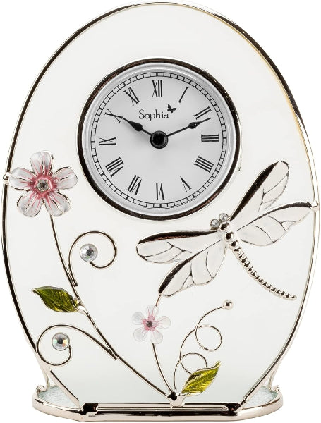 Decorative clock with floral and dragonfly designs on a white background