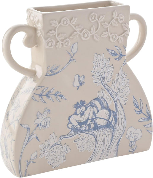 Decorative vase with blue floral and animal design on beige background