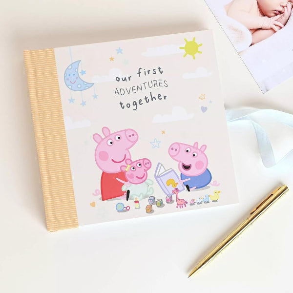 Children's book titled 'Our First Adventures Together' with Peppa Pig illustrations on a light background.