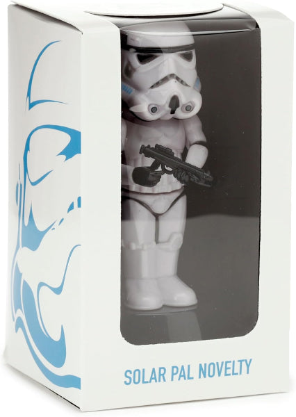 Toy figure in a box labeled 'Solar Pal Novelty' with a white and blue design.