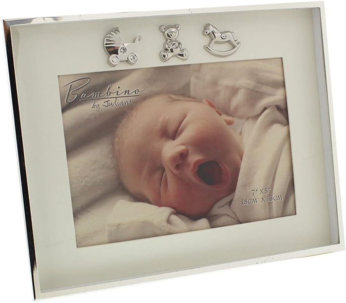 A square silver picture frame with a white mat, featuring three small silver decorative charms (a stroller, a teddy bear, and a rocking horse) along the top. The frame is shown holding a sample baby photo with the text 'Bambino by January' and '1st Baby' printed on it.