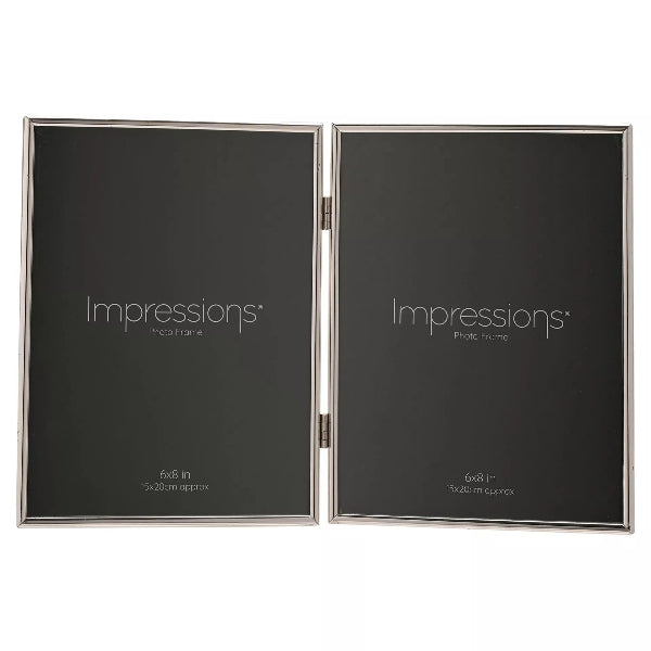 Two black photo frames with silver frames on a white background