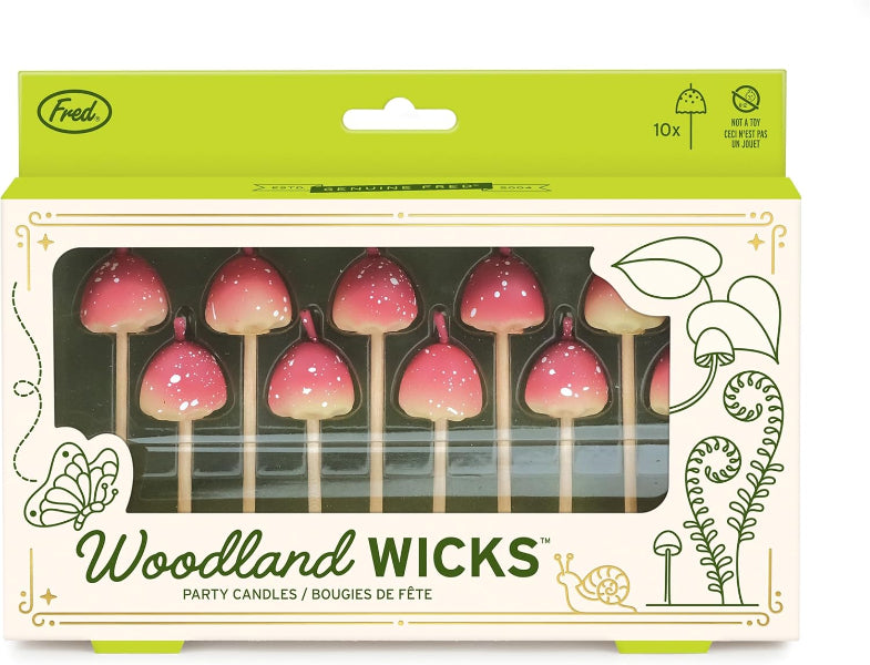 Packaging of Woodland Wicks party candles with a green top and decorative elements.