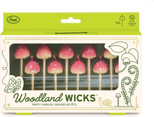 Packaging of Woodland Wicks party candles with a green top and decorative elements.