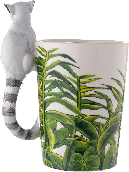 Mug with a cat-shaped handle and tropical leaf design