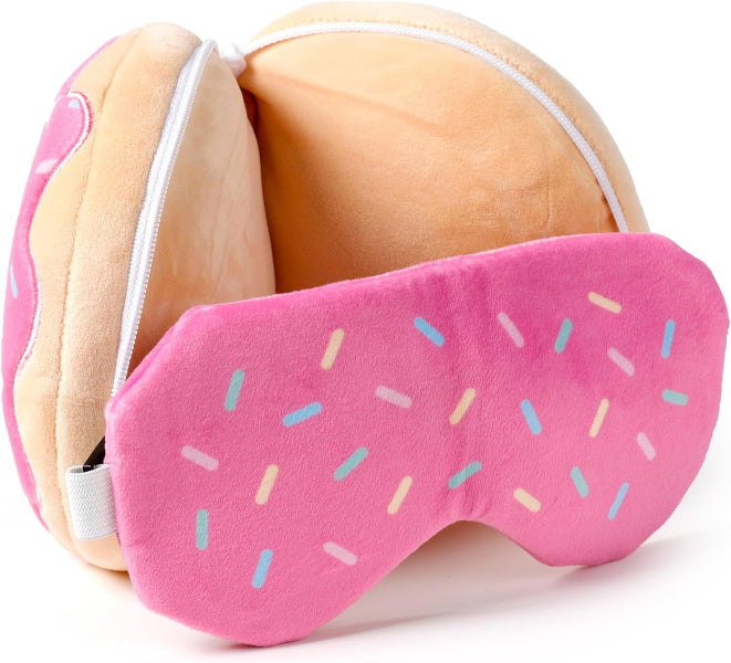 Pink donut-shaped eye mask with sprinkles on a white background