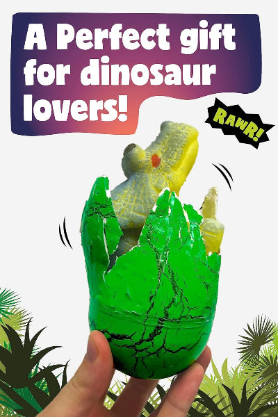 Toy dinosaur emerging from a green egg with text 'A Perfect gift for dinosaur lovers!' and 'RAWR!' on a white background.
