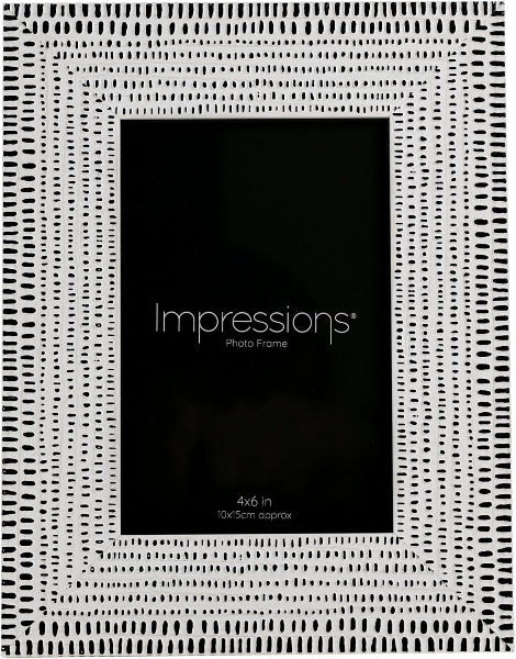 Black photo frame with white textured border on a white background