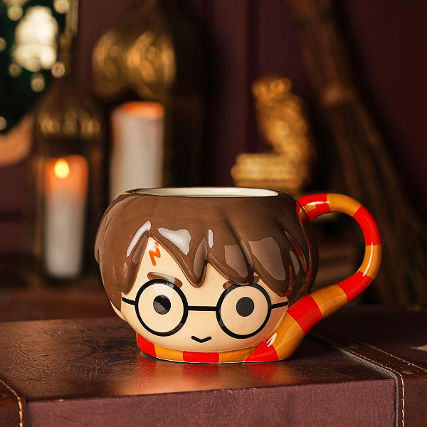 Harry Potter-themed mug with character design on a wooden surface.