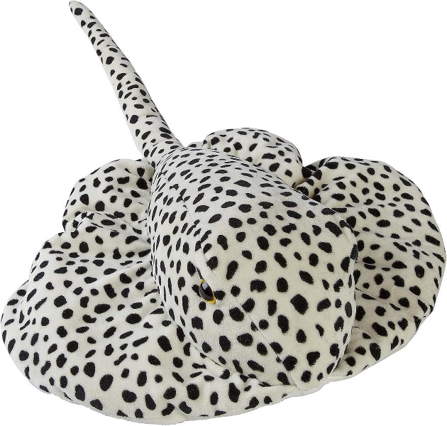 A plush stuffed ray or stingray toy with a black-and-white spotted pattern, photographed on a plain white background.