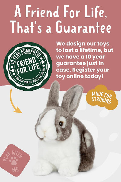 Stuffed rabbit toy with promotional text and branding on a pink background