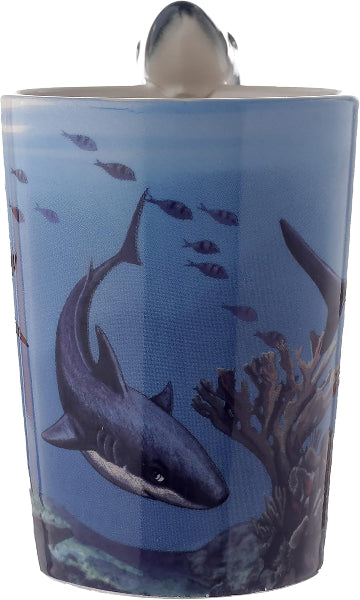 Tumbler with shark and underwater scene design on a blue background