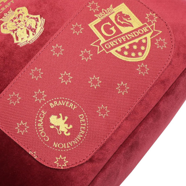Red fabric with gold Gryffindor logos and text on a white background