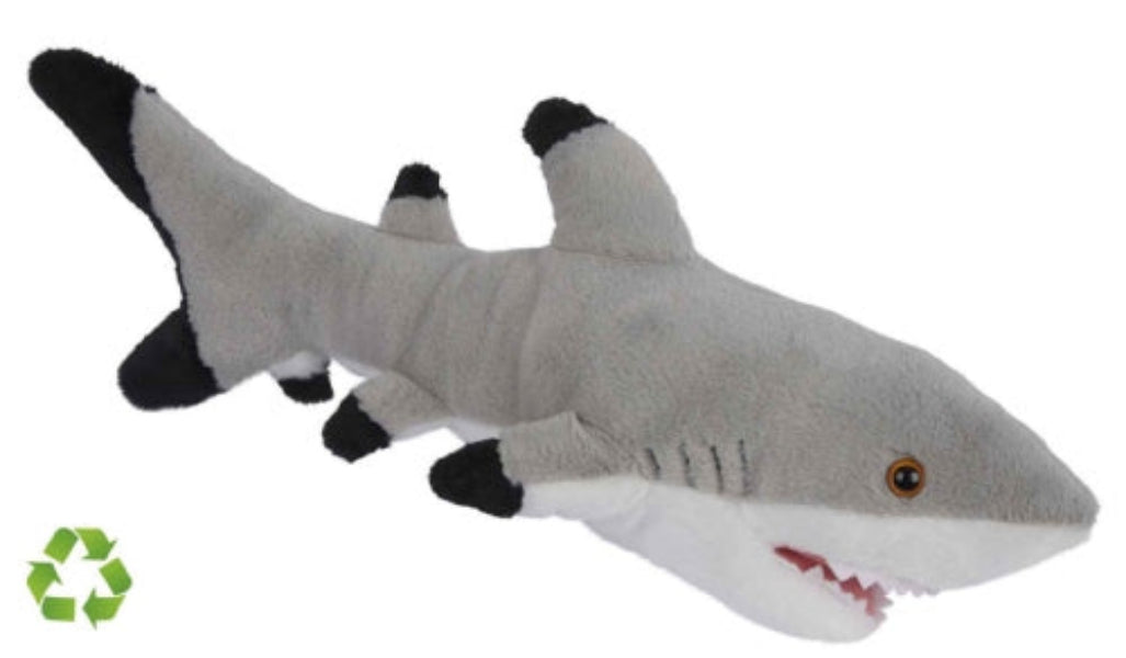 Plush shark toy with a recycling symbol on a white background