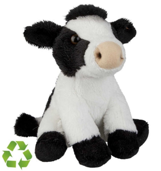 A black and white plush cow toy with a beige snout, sitting against a plain white background. A green recycling symbol is overlaid in the bottom-left corner.