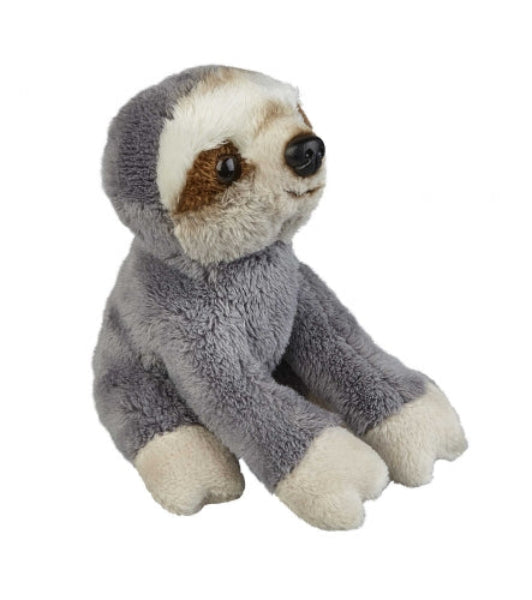 A plush sloth toy sitting upright against a plain white background. The toy has a soft gray body, a cream-colored face and feet, and small brown patches around the eyes.