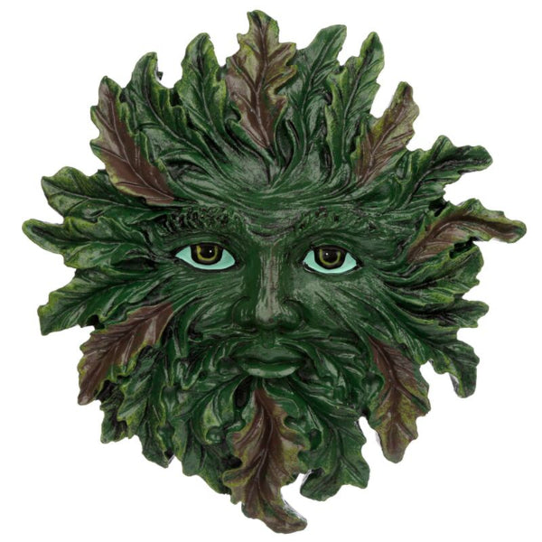 Green leafy mask with detailed facial features on a white background