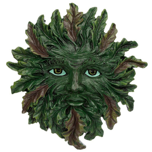 Green leafy mask with detailed facial features on a white background