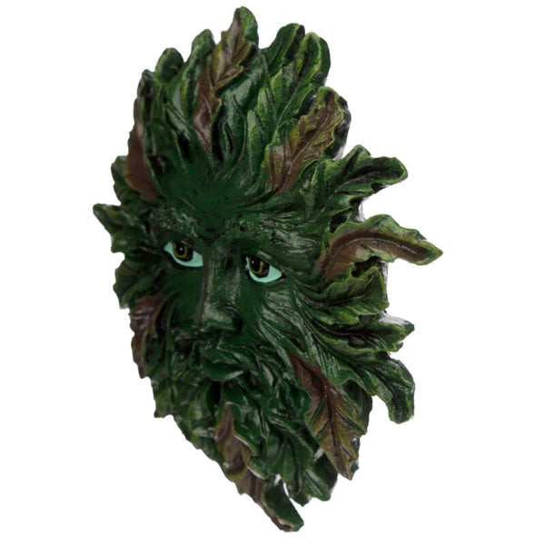 Green leafy mask with detailed texture on a white background