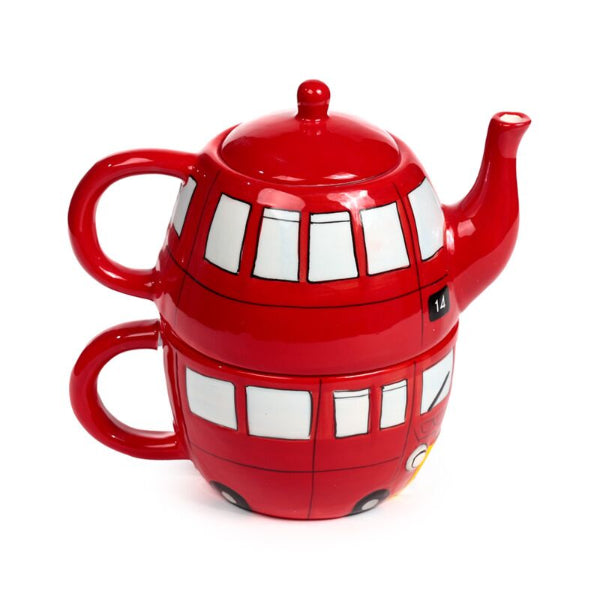 Red teapot and mug set with window design on a white background