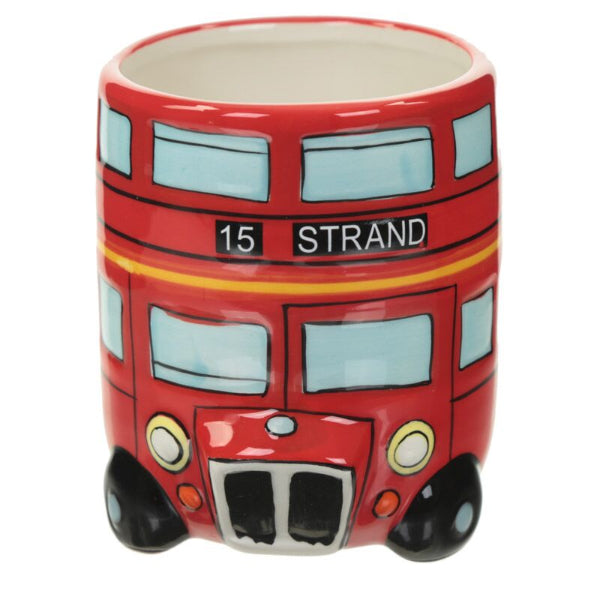Red ceramic mug shaped like a double-decker bus with 'Strand' text on a white background