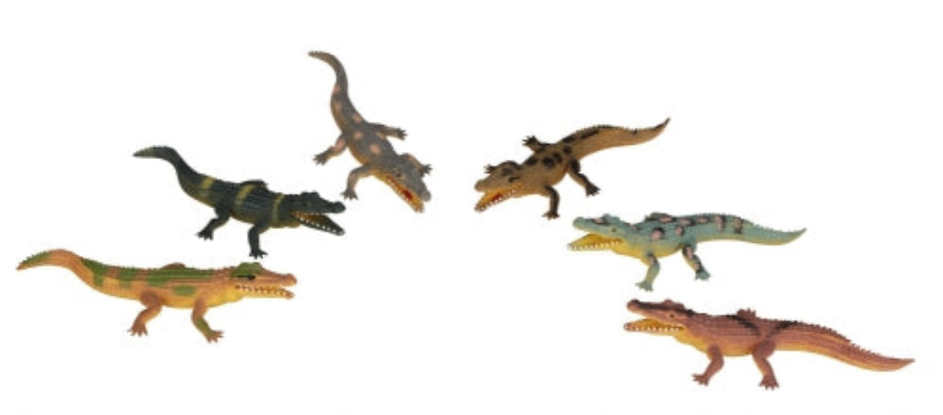 Set of six alligator figurines on a white background