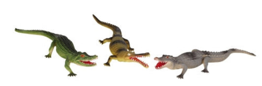 Three toy crocodile or alligator figurines in different poses on a plain white background.