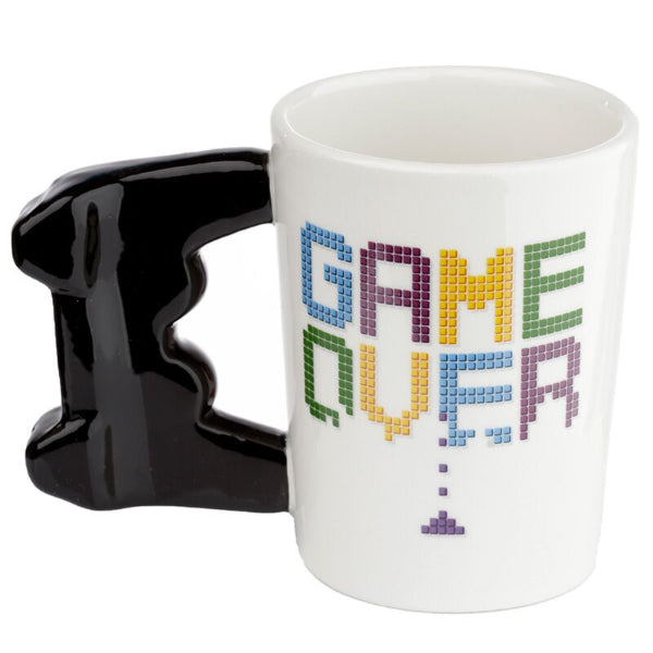 White mug with black handle featuring 'GAME OVER' text in colorful letters on a white background