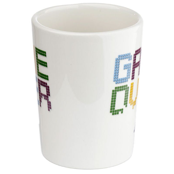 White mug with colorful text design on a white background