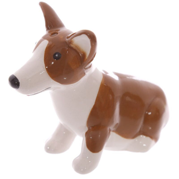 Dog-shaped ceramic salt and pepper shaker on a white background