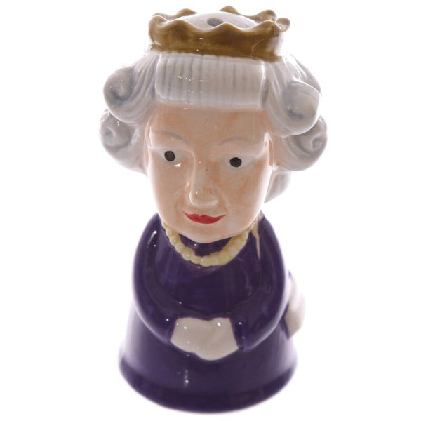 Ceramic bust of a woman with a crown on a white background