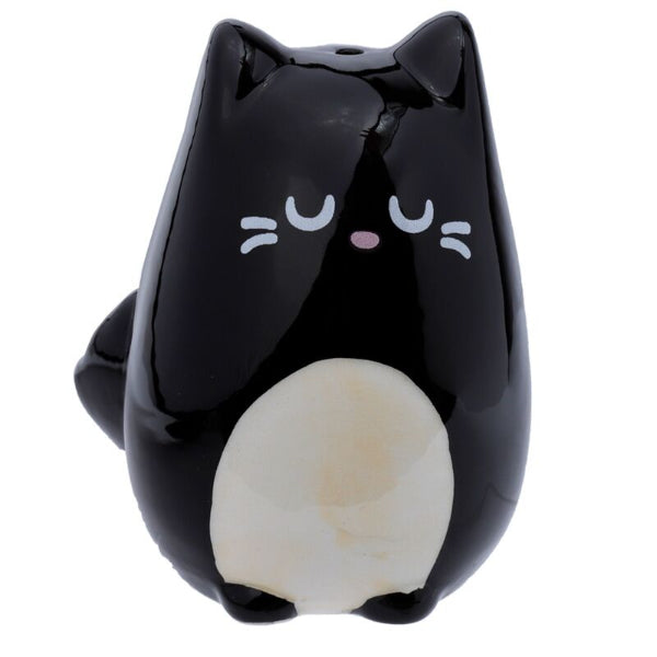 Black cat-shaped container with a white paws on a white background