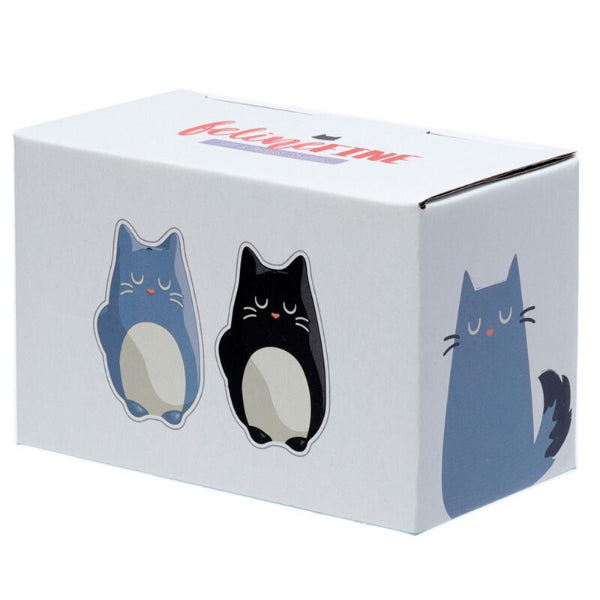 White box with cat illustrations and 'Feliz Navidad' text on a white background