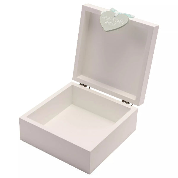 White jewelry box with a heart-shaped tag on a white background