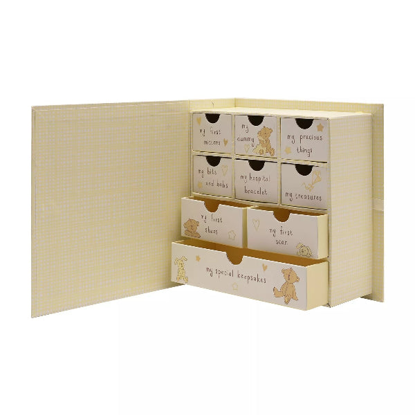 Beige keepsake box with drawers labeled with baby-themed text and illustrations on a white background.