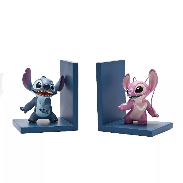 Two cartoon character bookends, one blue and one pink, on a white background.