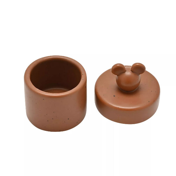 Ceramic container with a lid featuring bear ears on a white background