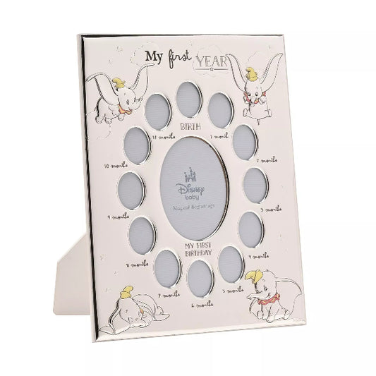 Baby milestone card with Dumbo illustrations and text on a white background
