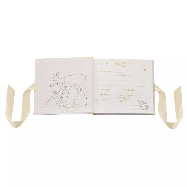 Open book with illustrations and text on a white background