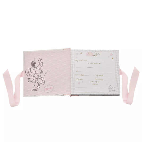 Open book with cartoon character and text on a white background