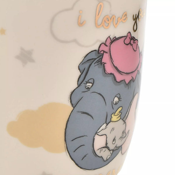 Ceramic mug with cartoon elephant design and 'I love you' text