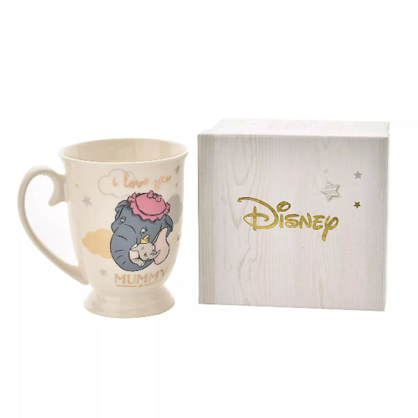 Mug with Disney character design next to a branded box on a white background