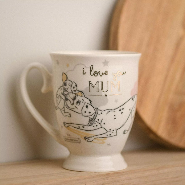Mug with dog illustration and 'I love you MUM!' text on a wooden surface