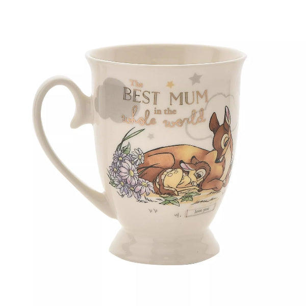 Mug with cartoon characters and floral design on a white background