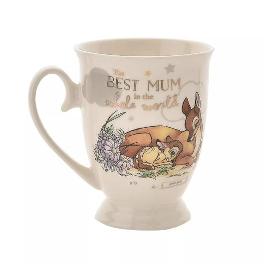 Mug with cartoon characters and floral design on a white background