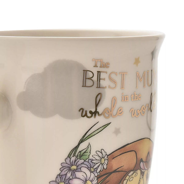 Mug with 'The Best Mum in the Whole World' text and floral design.
