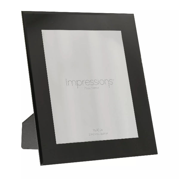 Black photo frame with 'Impressions' branding on a white background